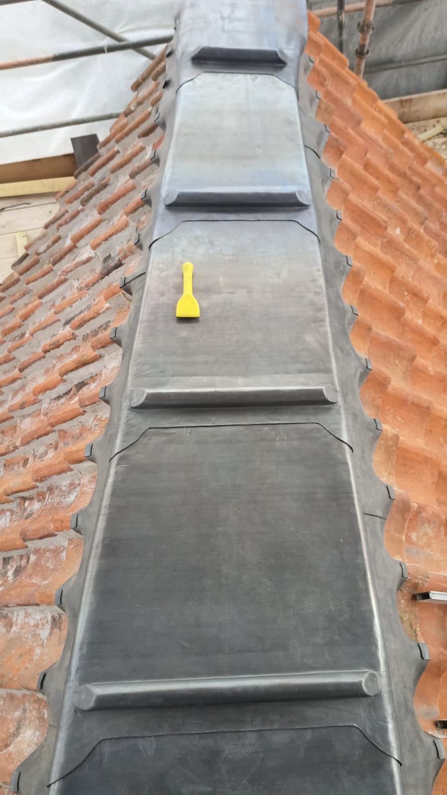 Lead ridge detail over clay pantiles, Le Hocq