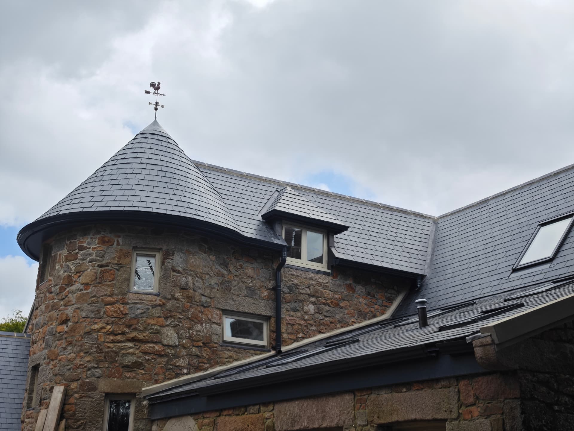 Conical slate turret and lead dormer detail, La Grande Rue