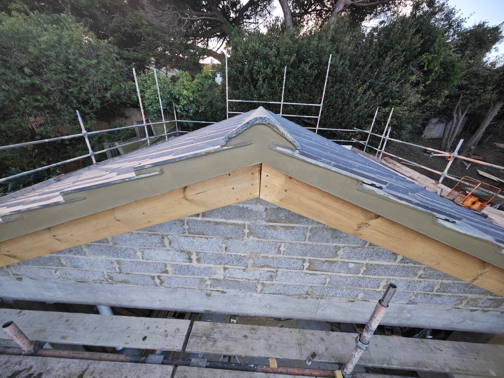 New build roof ridge with membrane and verge detail, Kampong