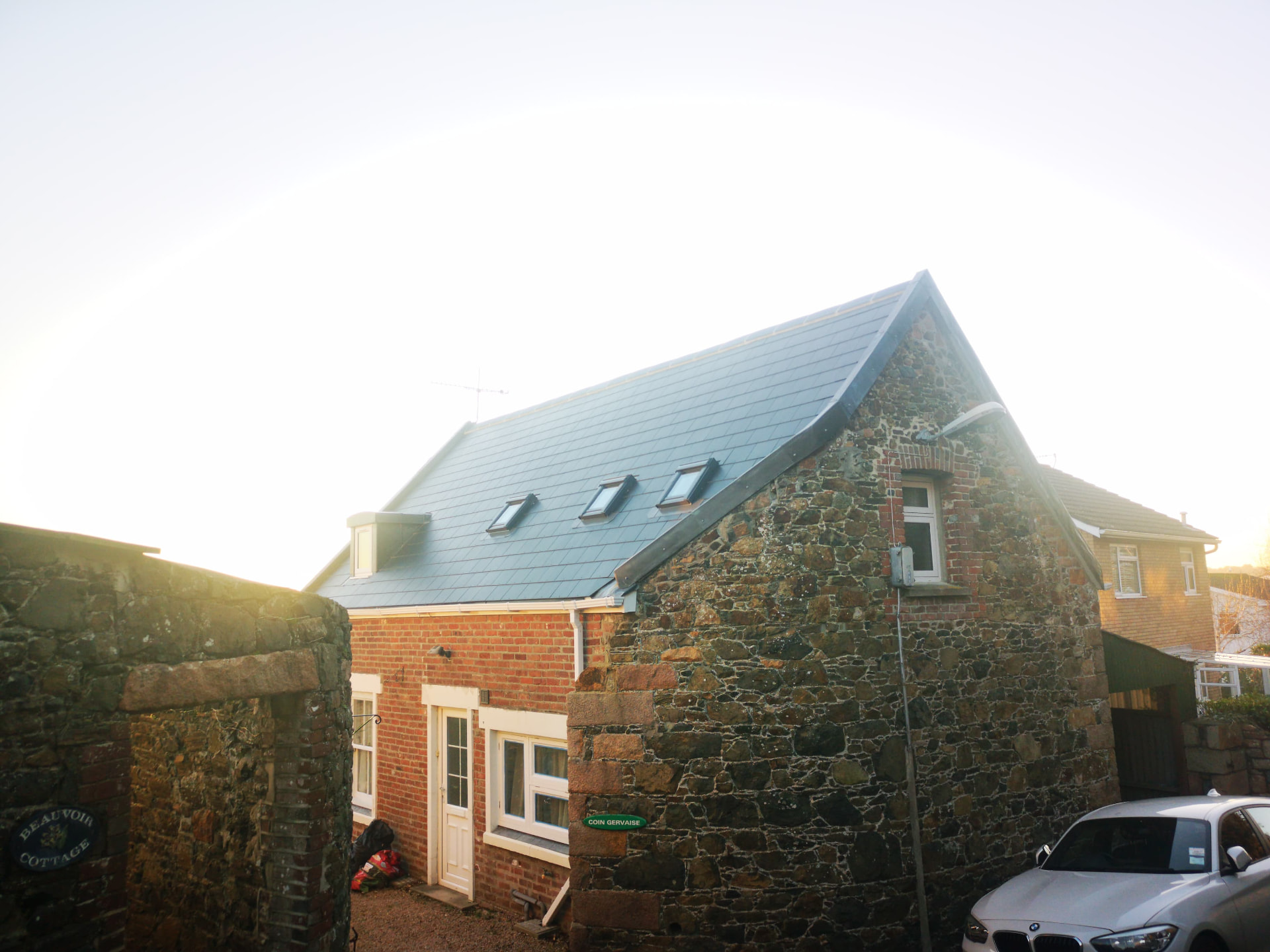Reroofed slate cottage with new dormer and velux windows, Coin Gervais