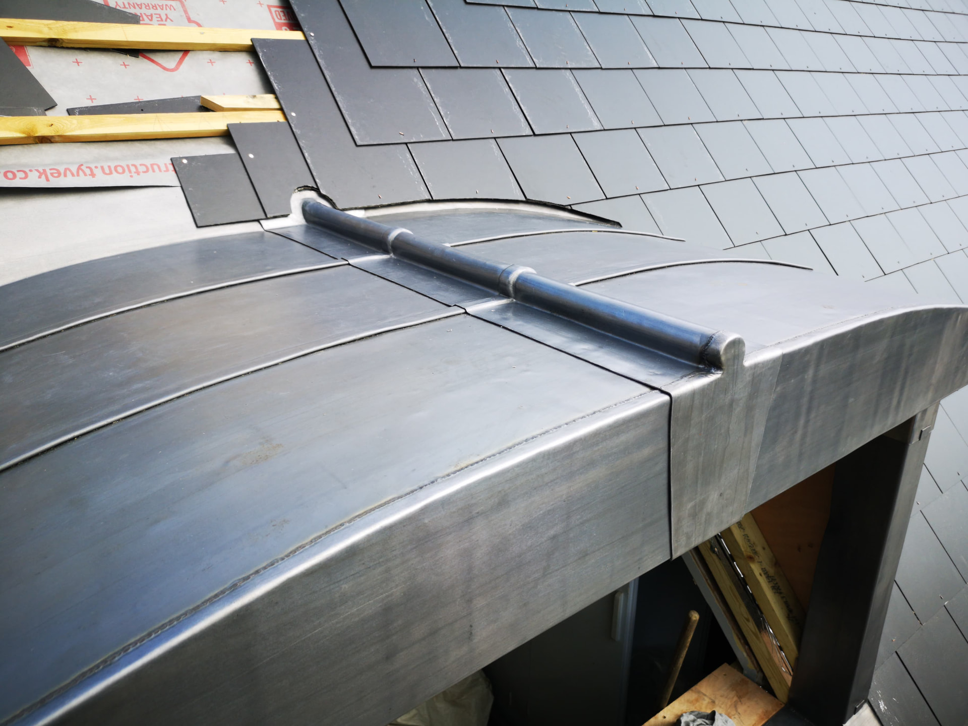 Curved lead dormer roof with welted seams and roll detail, Brookvale