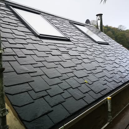 Reroof with random width and length slate fixed in a staggered pattern, La Vielle Forge
