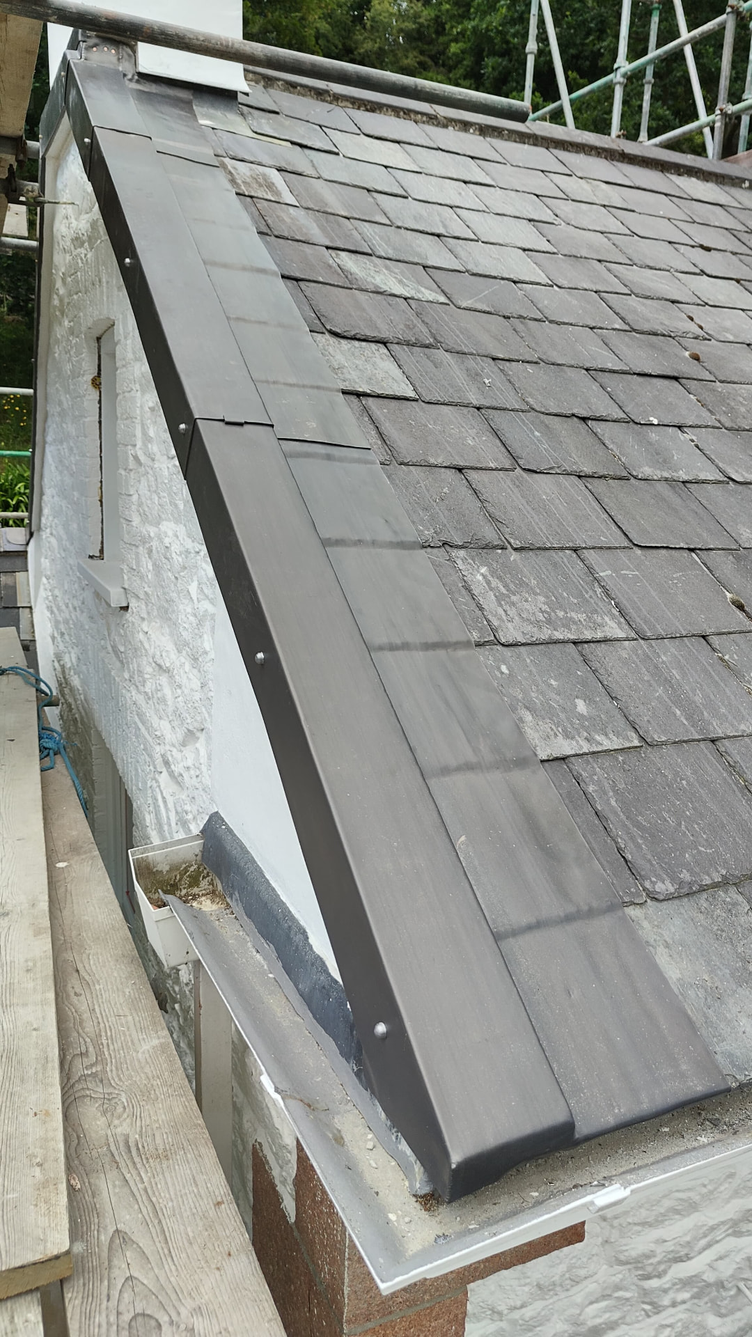 Lead capping to a Jersey verge alongside a slate roof, Grande Vaux