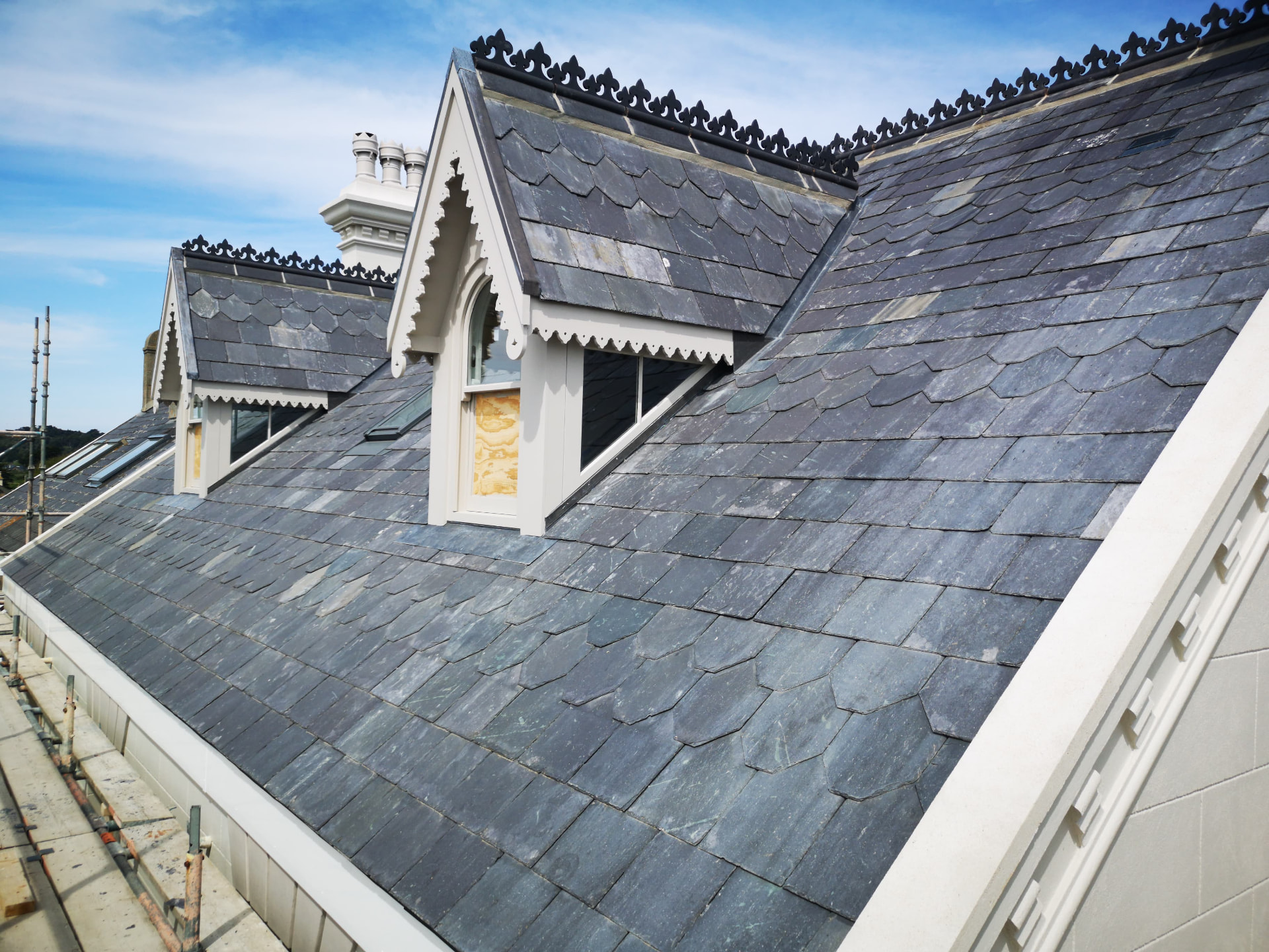 Listed building reroofed in natural slate with gothic dormers and ridge cresting, Pond View